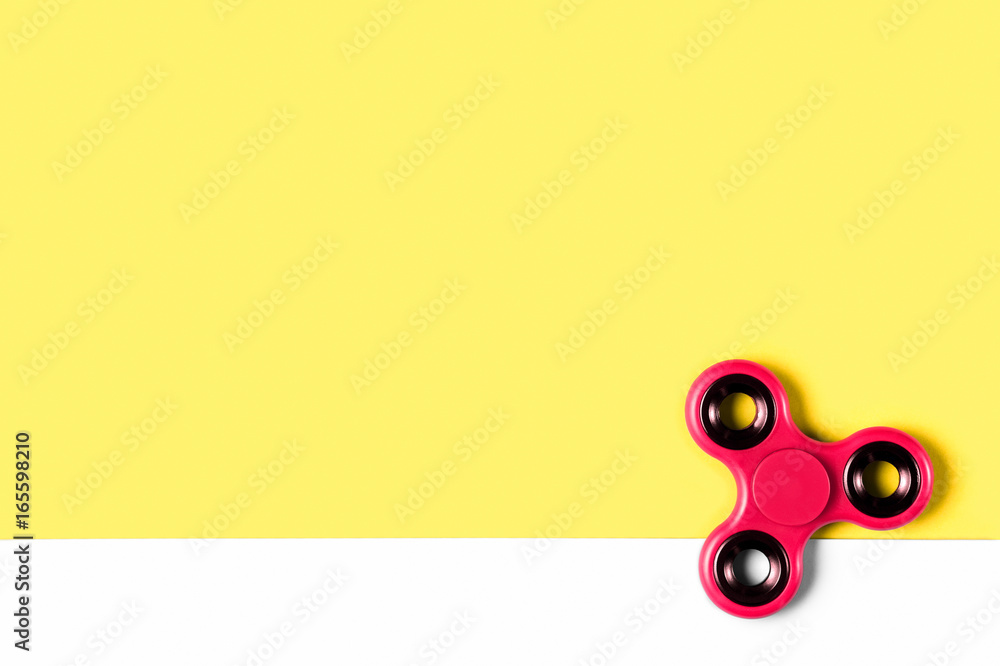 Fidget spinner background template with copy space. Popular kids stress and  anxiety relief toy in the bottom right corner. Stock Photo | Adobe Stock