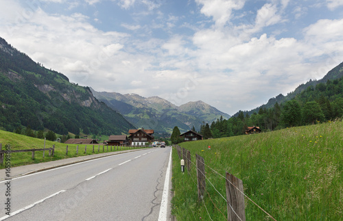Road among the Alpine mountains