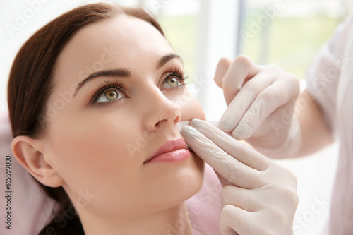 Woman having hair removal p...