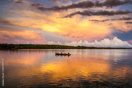 Fototapeta Naklejka Na Ścianę i Meble -  Canoe at sunrise