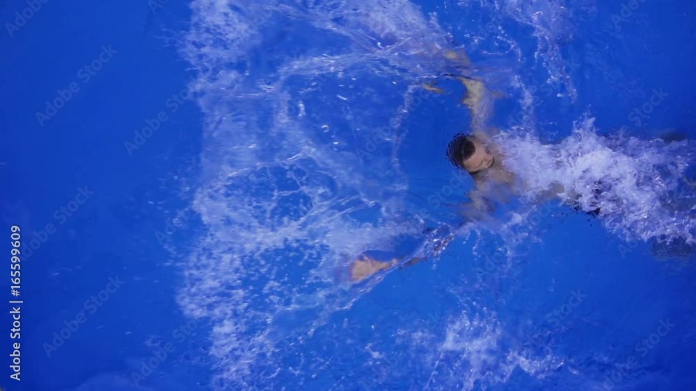 High Angle teenager back Dip in Plunge Pool, Slow Motion High Angle teenager back Dip in Plunge Pool, Slow Motion