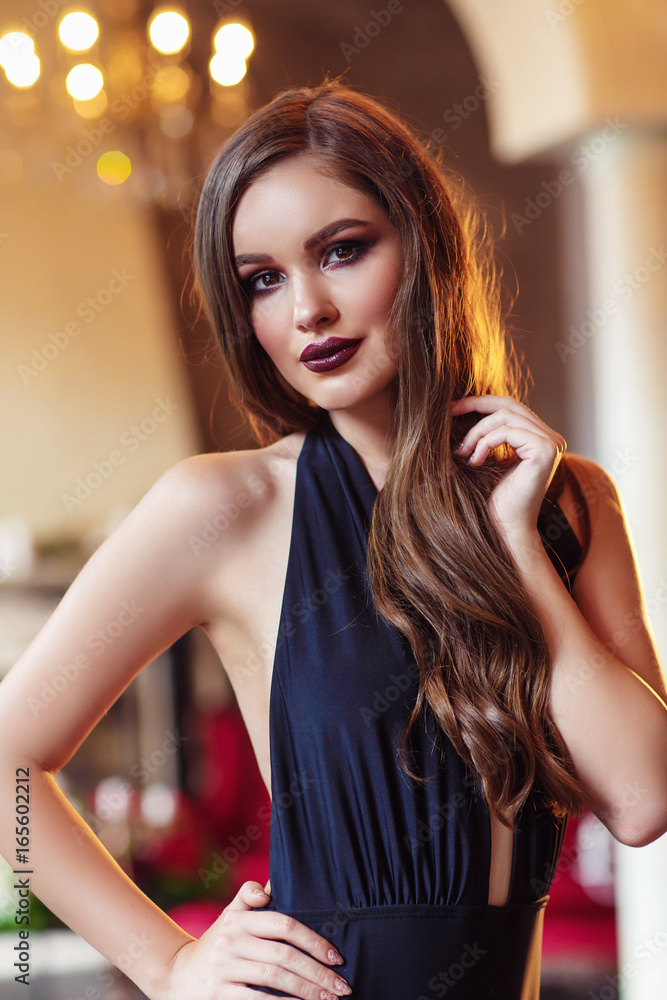 Naklejka premium Fashion portrait of a beautiful young woman