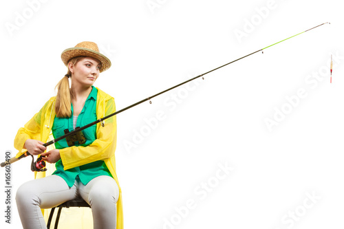 Obraz na plátne Woman with fishing rod , spinning equipment