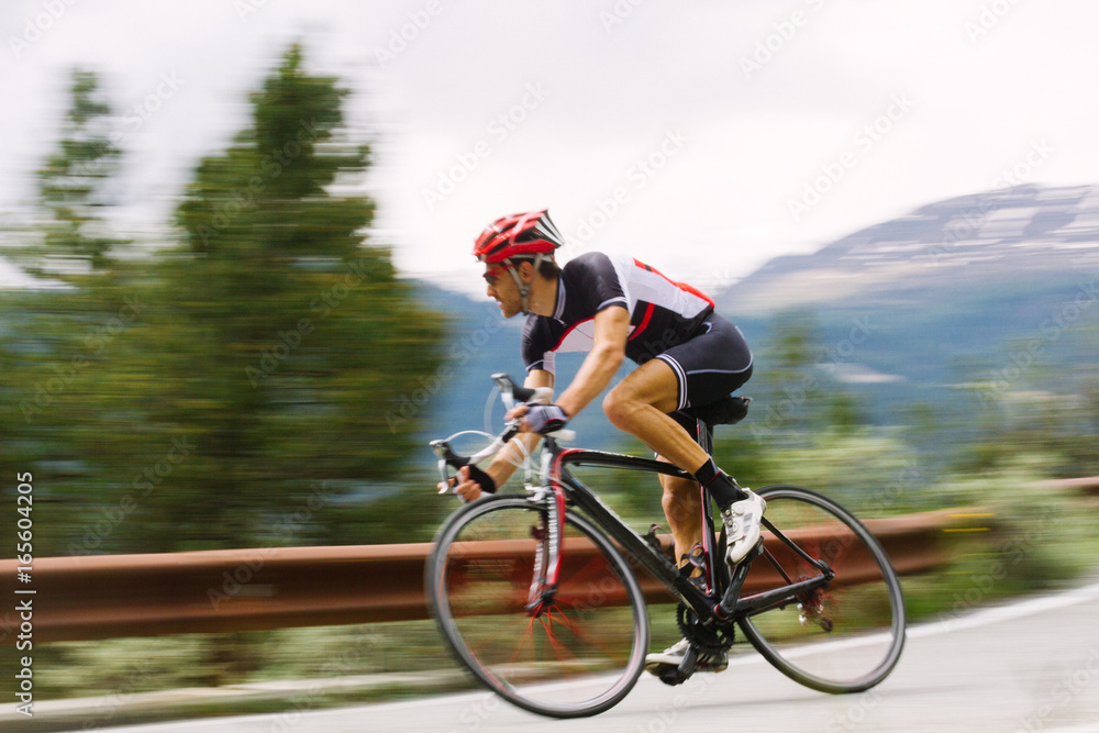 Cyclist on a mountain road Cyclist on a mountain road