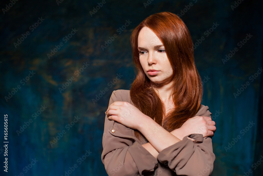 Dissatisfaction red-haired woman posing Dissatisfaction red-haired woman posing