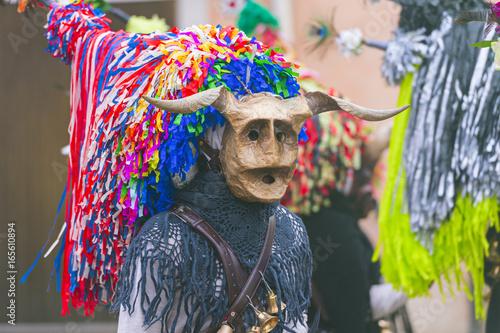 Fototapeta Naklejka Na Ścianę i Meble -  Mask with horn and hat at Aliano province of Matera