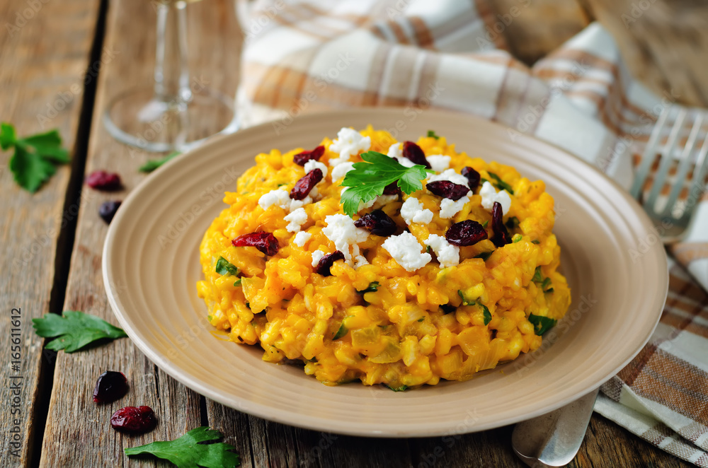 Pumpkin risotto with dried cranberries and goat cheese Pumpkin risotto with dried cranberries and goat cheese