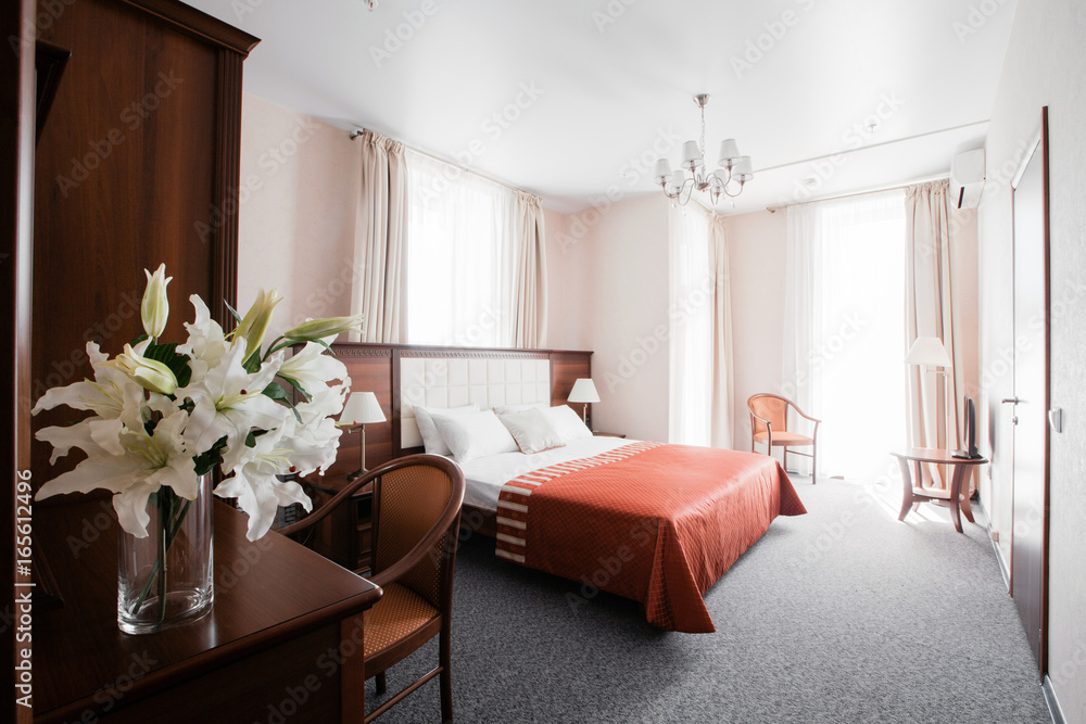 Fototapeta premium Hotel apartment, bedroom interior in the morning