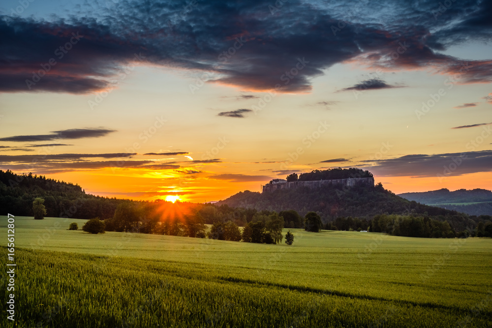 Sunset over the Koenigstein fortress in Saxon Switzerland, Germany