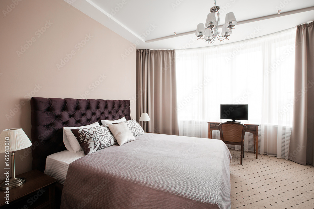 Fototapeta premium Hotel apartment, bedroom interior in the morning