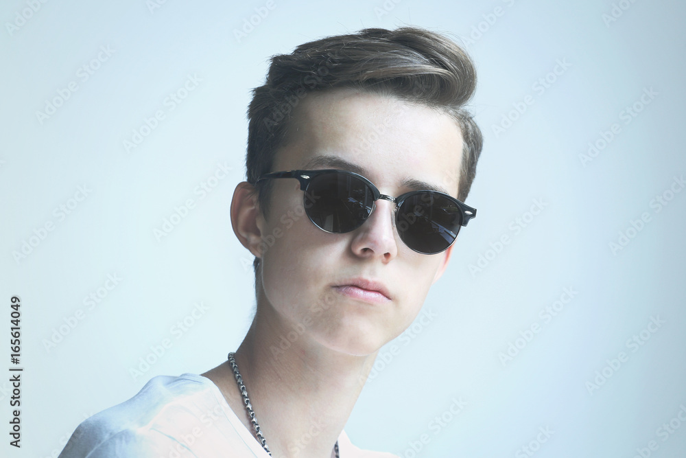 Young man serious portrait in sunglasses Young man serious portrait in sunglasses