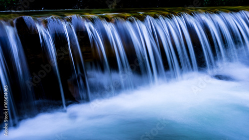 small cascade of mountain river