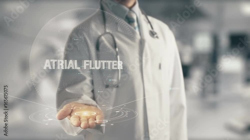 Doctor holding in hand Atrial Flutter photo