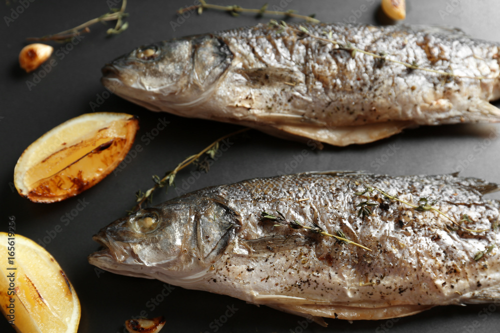 Fried fish on black background Fried fish on black background
