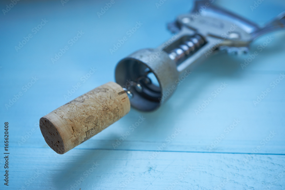 closeup of wine cork and corkscrew closeup of wine cork and corkscrew