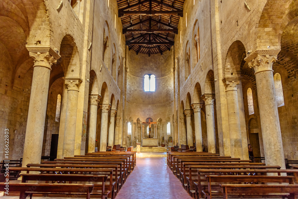 The central nave of the ancient Romanesque church of Sant'Antimo near Montalcino in Tuscany