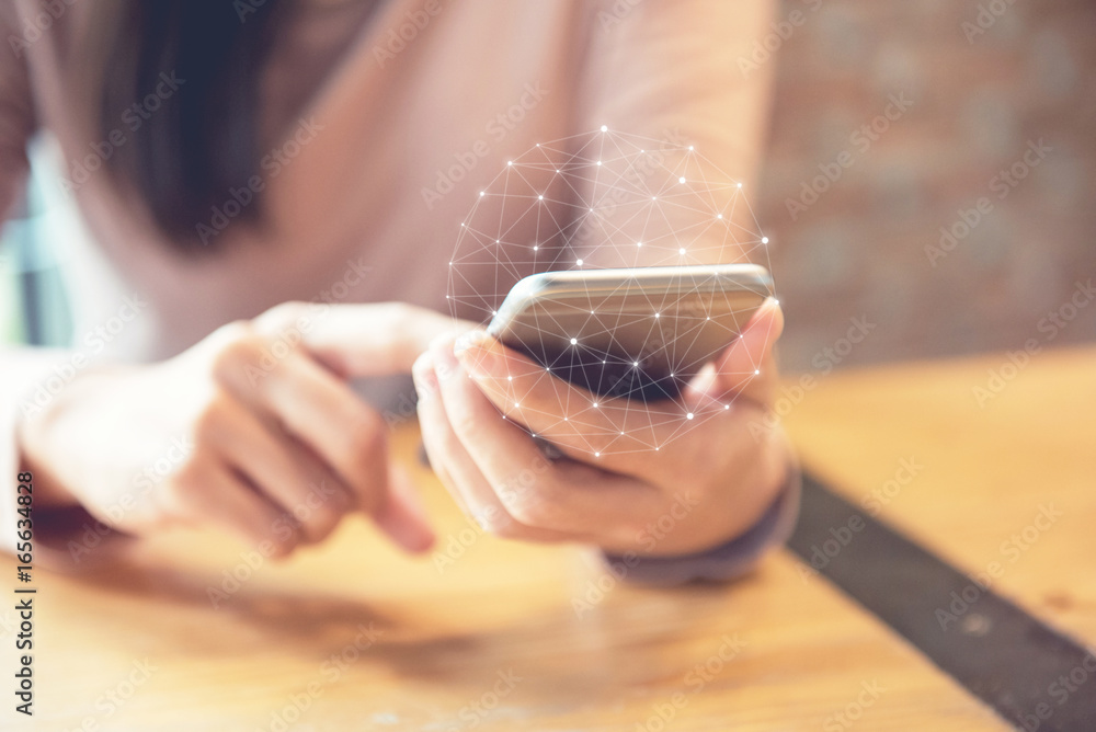 Woman hand holding mobile phone, She using in mobile applications and multimedia programs. Woman hand holding mobile phone, She using in mobile applications and multimedia programs.
