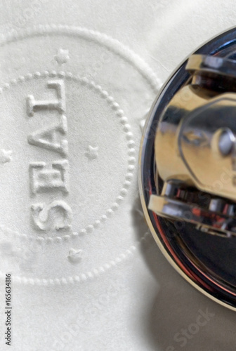 Antiforgery Seal: Official Notary or Corporate Original Document with Embossed Raised Seal 