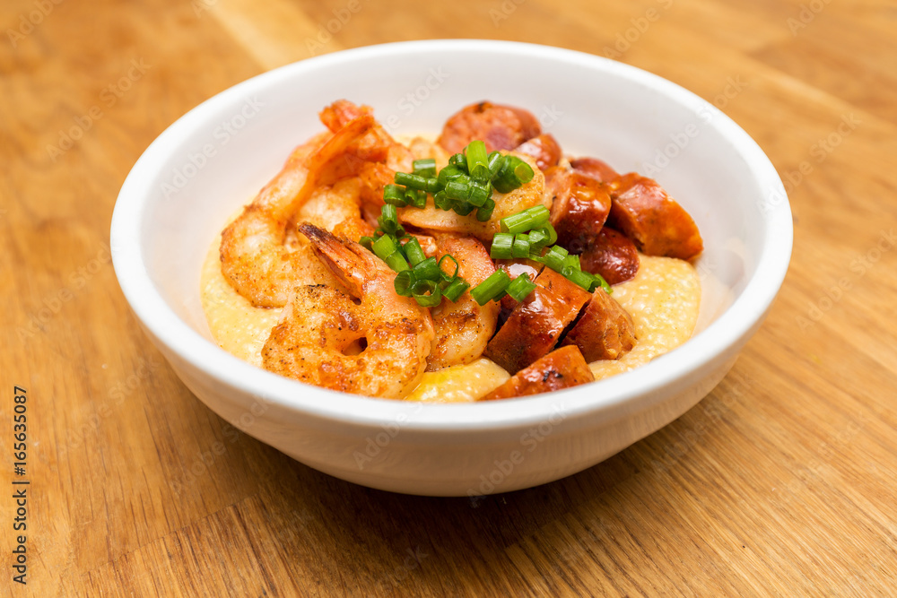 Shrimp and cheese grits with andouille sausage and green onions. Shrimp and cheese grits with andouille sausage and green onions.
