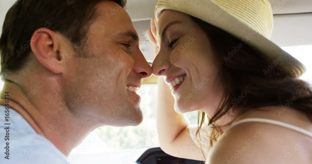 Couple interacting with each other in the car Couple interacting with each other in the car