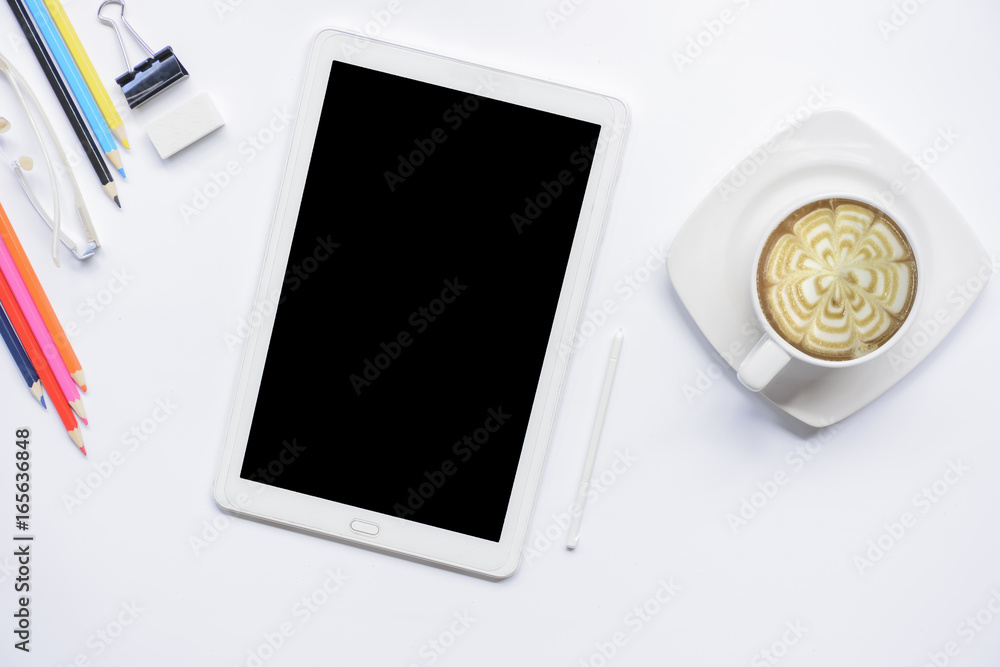 Tablet computer with coffee and equipment office on isolated.Top view and zoom in Tablet computer with coffee and equipment office on isolated.Top view and zoom in