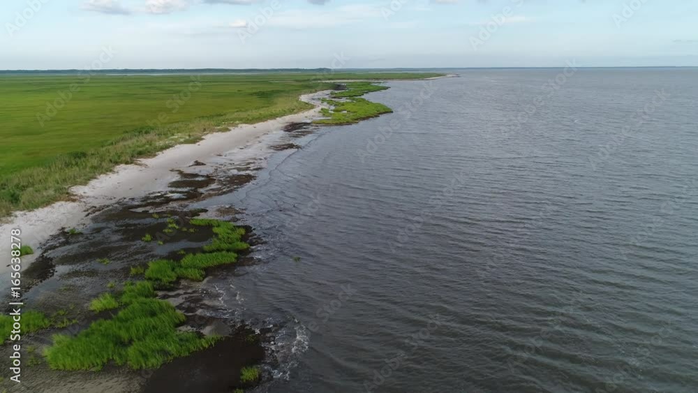 Aerial View Flying over the Marsh and Delaware Bay Beach New Jersey Aerial View Flying over the Marsh and Delaware Bay Beach New Jersey