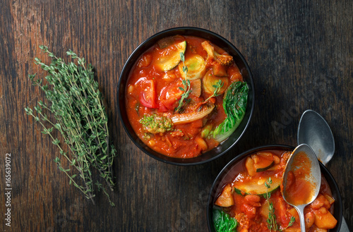 Photos Two bowl of soup minestrone with seasonal vegetables