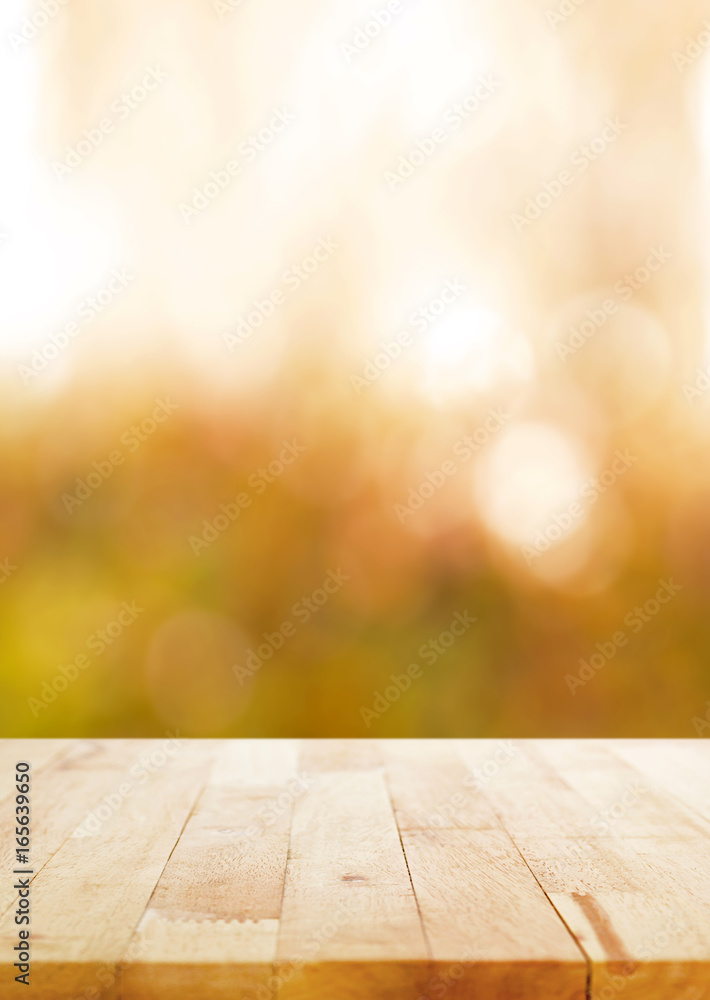 Wood table top on blurry abstract background Wood table top on blurry abstract background