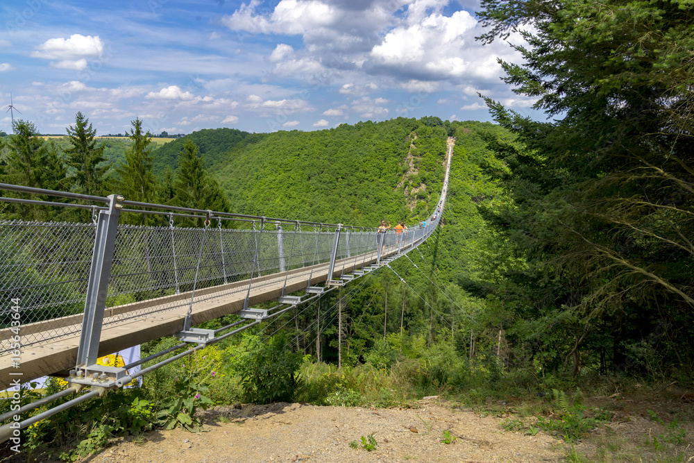 Moersdorf, Rhineland-Palatinate/ Germany July 18 2017: Germany's largest suspension bridge Geierlay in Moersdorf at Hunsrueck mountains