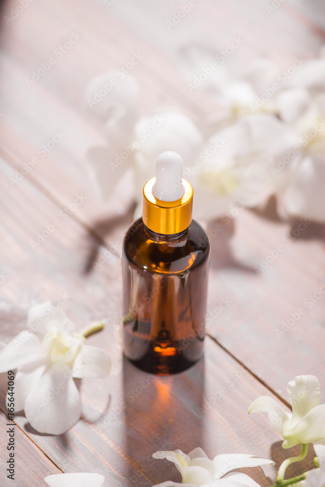 Bottle of aroma essential oil or spa and natural fragrance oil Bottle of aroma essential oil or spa and natural fragrance oil