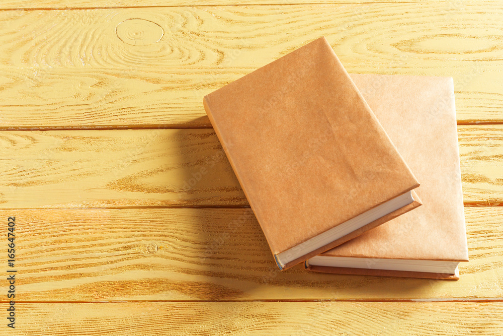 Fototapeta premium Books on the old Wooden table