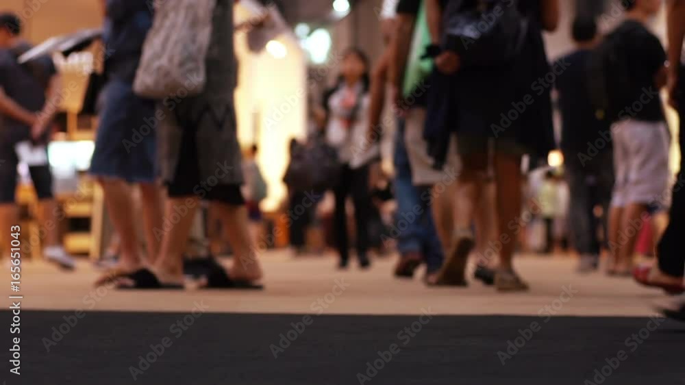 Crowd of shoppers looking for bargains at a Furniture Fair annual sale in a busy Exhibition Center Crowd of shoppers looking for bargains at a Furniture Fair annual sale in a busy Exhibition Center