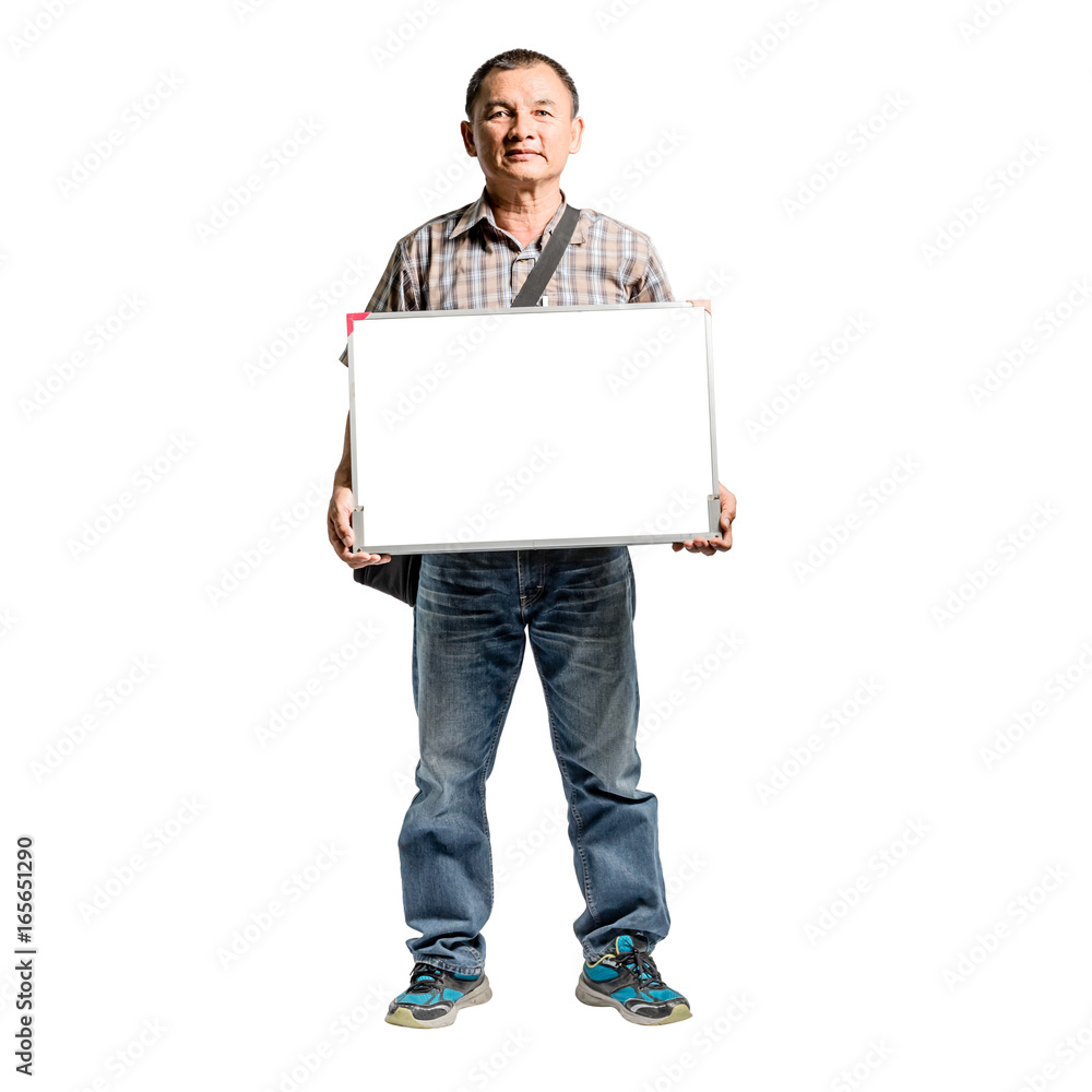 Portrait of a happy mature man standing in scott shirt and blue jeans holding the blank message board. Isolated full length on white background with copy space and clipping path Portrait of a happy mature man standing in scott shirt and blue jeans holding the blank message board. Isolated full length on white background with copy space and clipping path
