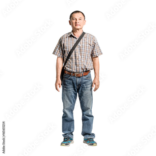 Portrait of a happy mature man standing in scott shirt and blue jeans. Isolated full length on white background with copy space and clipping path