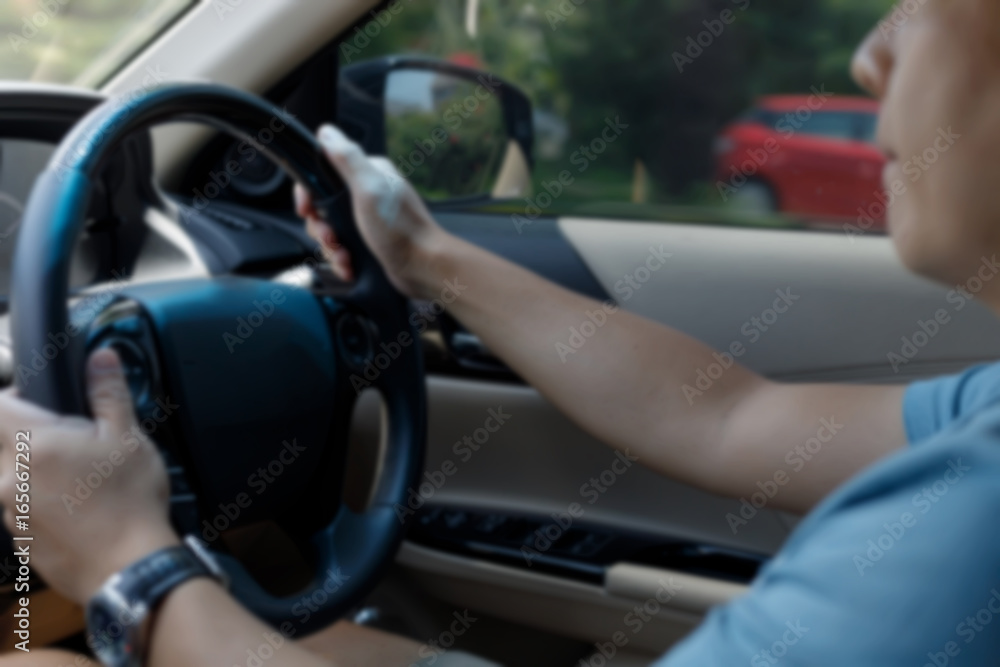 blur image, man hand holding control steering wheel drive car blur image, man hand holding control steering wheel drive car