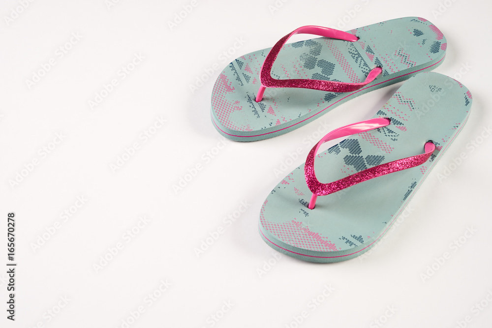 Summer beach shoes isolated on white background with copy space. Summer beach shoes isolated on white background with copy space.