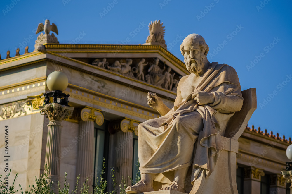 Marble statue of the philosopher Plato on the background of Greek Academy Marble statue of the philosopher Plato on the background of Greek Academy