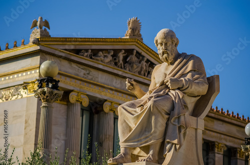 Marble statue of the philosopher Plato on the background of Greek Academy