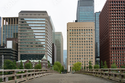 Cityscape with tall buildings and wide road