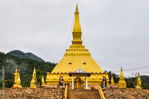 Golden stupa in Luang Nam Tha, Laos photo