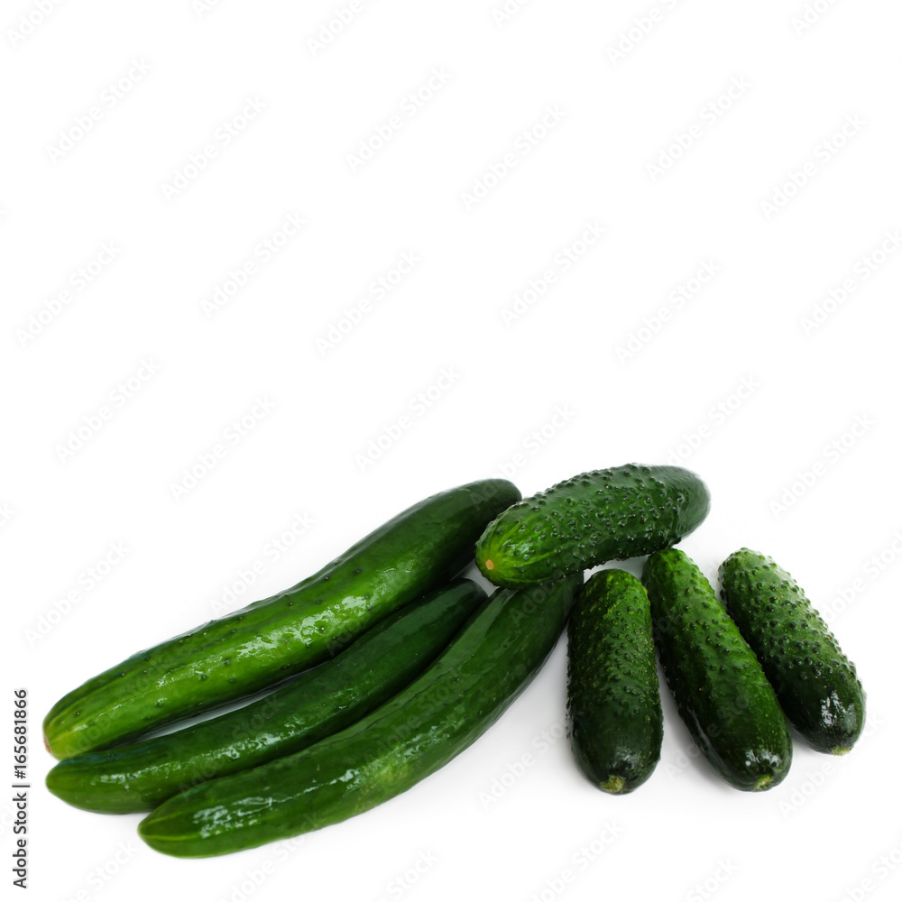 Fresh green cucumbers isolated on white background. Fresh green cucumbers isolated on white background.