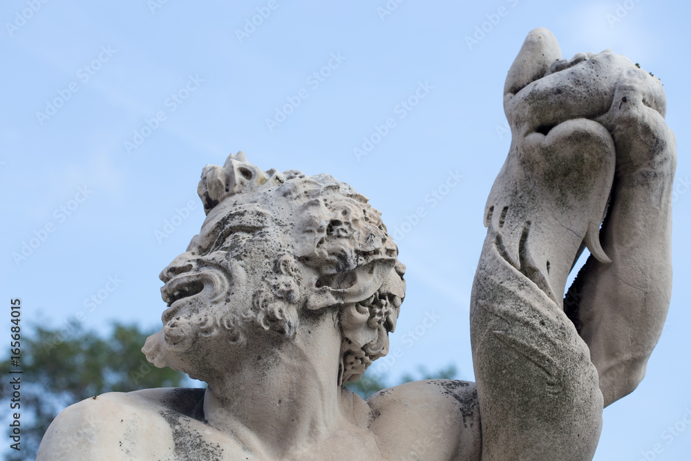 GENOA (GENOVA) ITALY, JULY, 19, 2017 - Triton statue in the the garden of the Prince's Palace, Andrea Doria's Palace in Genoa (Genova), Italy