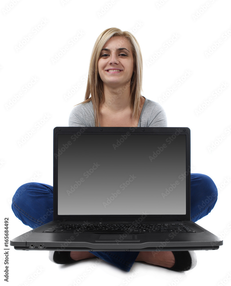 Cheerful girl showing laptop screen Cheerful girl showing laptop screen