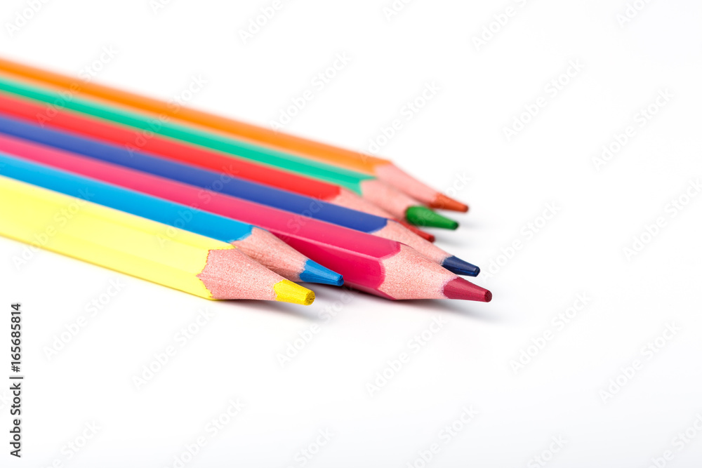Color pencils isolated on white background. Many different colored pencils. Colored drawing pencils in a variety of colors Color pencils isolated on white background. Many different colored pencils. Colored drawing pencils in a variety of colors