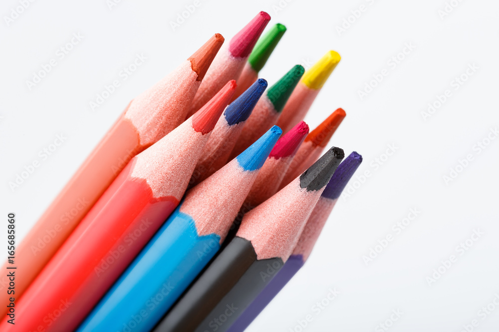 Color pencils isolated on white background. Many different colored pencils. Colored drawing pencils in a variety of colors Color pencils isolated on white background. Many different colored pencils. Colored drawing pencils in a variety of colors