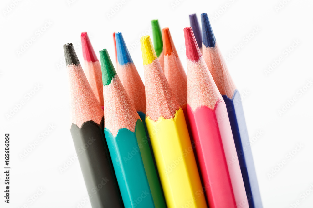Color pencils isolated on white background. Many different colored pencils. Colored drawing pencils in a variety of colors Color pencils isolated on white background. Many different colored pencils. Colored drawing pencils in a variety of colors