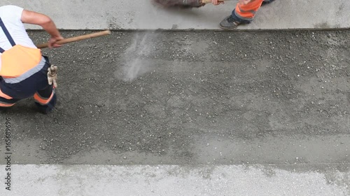 Leveling building site before asphalting