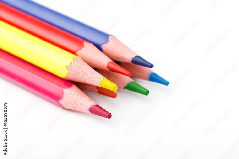 Color pencils isolated on white background. Many different colored pencils. Colored drawing pencils in a variety of colors Color pencils isolated on white background. Many different colored pencils. Colored drawing pencils in a variety of colors