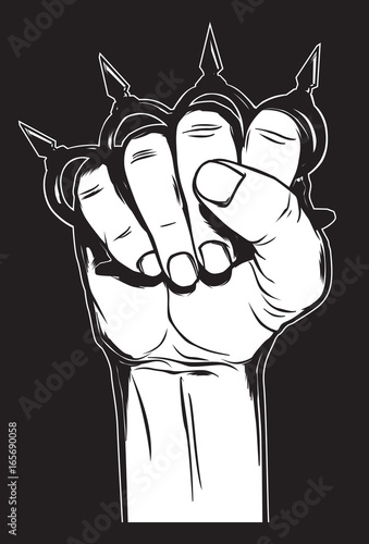 Human hand with brass knuckles. Criminal illustartion