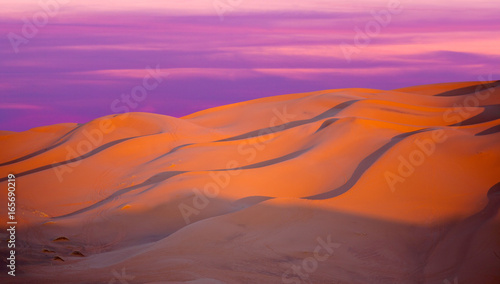 Beautiful sunset over sand dunes abstract background. Sahara desert in Morocco  Africa
